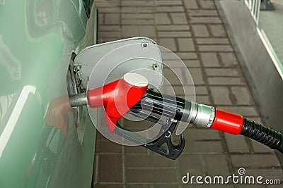 Red gas station nozzle
