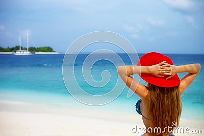 Red hat on the beach