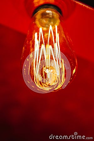 Red light bulb glowing