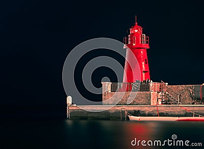 Red Lighthouse by Night