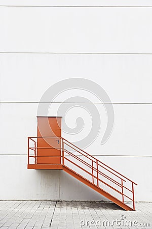 Red metal staircase on the outside