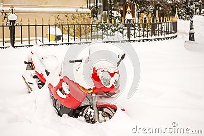 Red Motorcycle Covered Snow