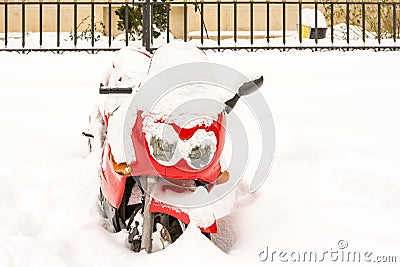 Red Motorcycle Covered Snow