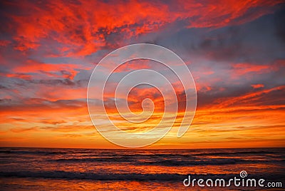 Red orange sky over sea