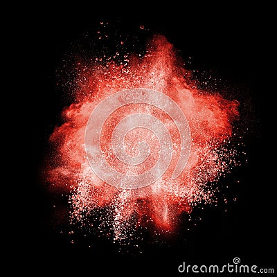 Red powder explosion isolated on black