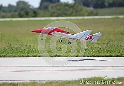 Red Radio Controlled Airplane takeoff