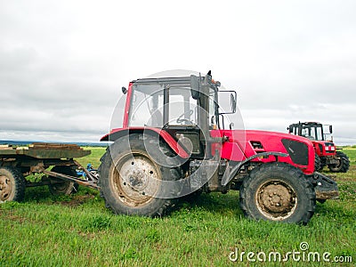 Red tractor in the field