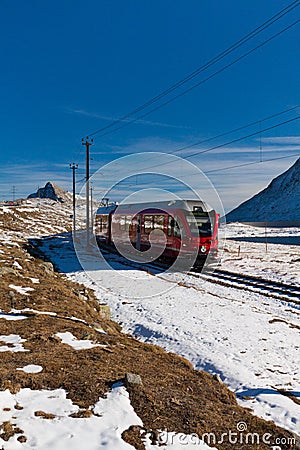 Red train and mountains