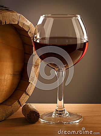 Red wine barrel and glass