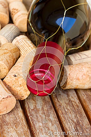 Red wine bottle and corks