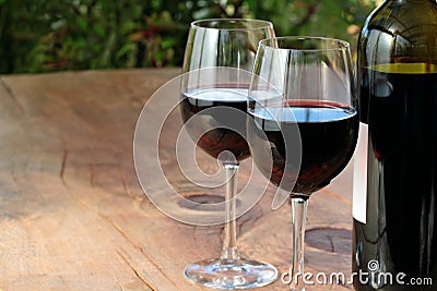 Red Wine on Outdoor Wooden Table