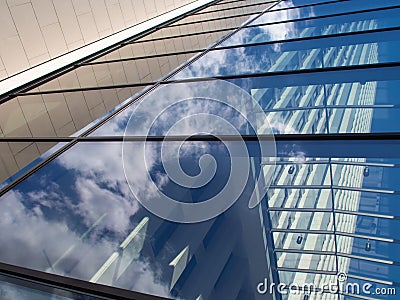 Reflection in the glass facade of a skyscraper in Frankfurt, Ger