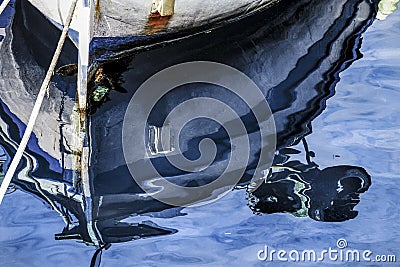 Reflection of the hull of the boat