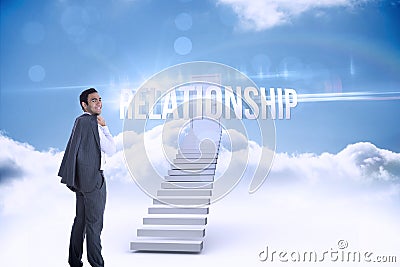 Relationship against shut door at top of stairs in the sky