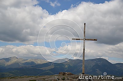 Religion: Wooden Cross on mountain top