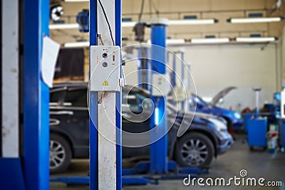Remote control of electric lift in car-care service