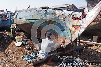 Repairing boat