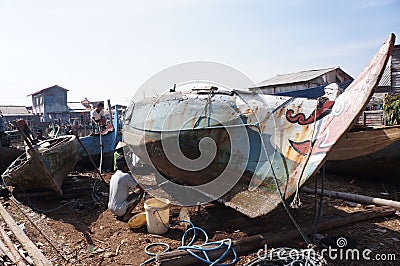 Repairing boat