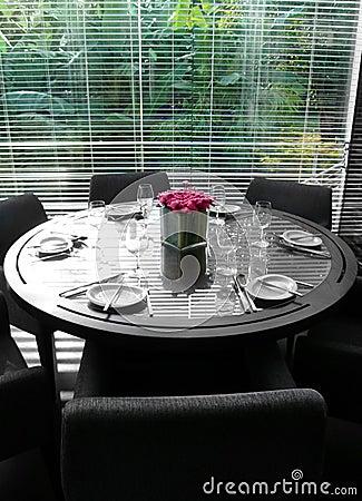 Restaurant interior, table, with garden view