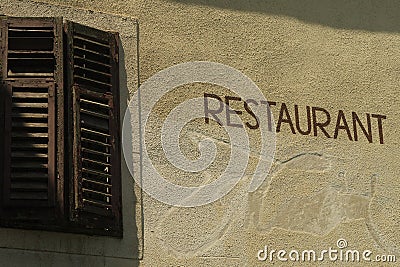 Restaurant sign on wall