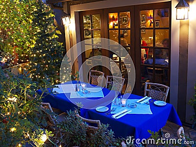 Restaurant tables in Christmas lighting