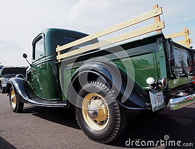 Restored Green And Black Antique Ford Delivery Truck