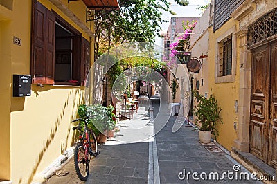 RETHYMNO,CRETE-JULY 23: Narrow street with cozy restaurants and bars on July 23,2014 in the old town of Rethymno city. Crete islan