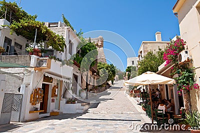 RETHYMNO,CRETE-JULY 23: Tourists have a rest in a local restaurant on July 23,2014 in the old town of Rethymno city on the island