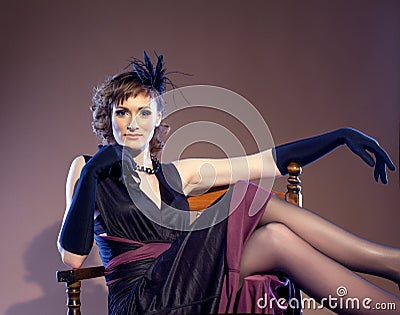 Retro middle aged actress posing looking at camera