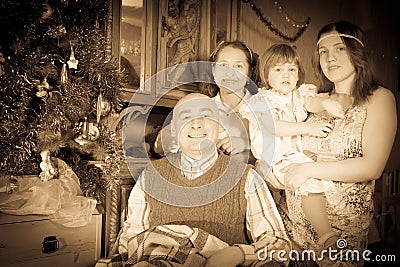 Retro photo of happy family of three generations
