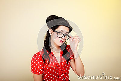 Retro. Portrait of pinup girl in eyeglasses
