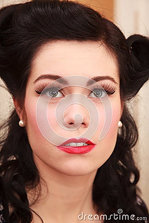 Retro. Portrait of woman girl with pinup hairstyle