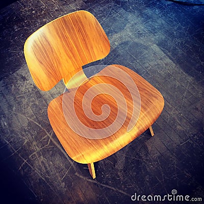 Retro style chair on dark floor