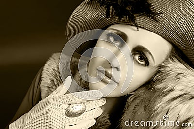 Retro style portrait of a young woman in hat