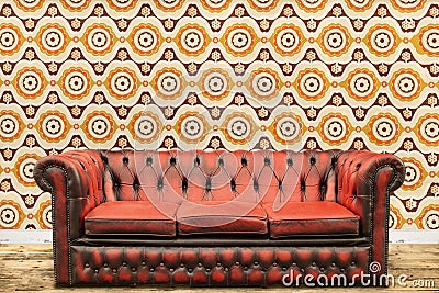 Retro styled image of an old sofa against a vintage wallpaper wa