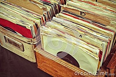 Retro styled image of vinyl lp records on a flee market