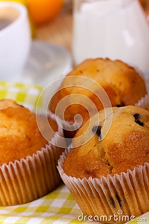 A rich breakfast with muffins , close up