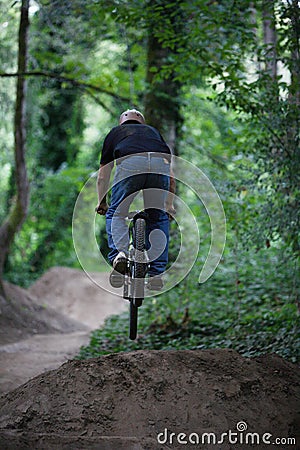 Rider jumping a bike