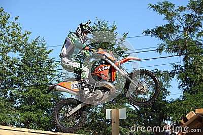 Rider jumping over