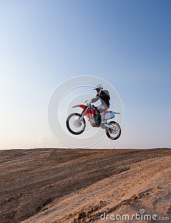 Rider performs stunts in desert