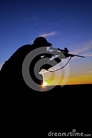 Rifle Hunter Shooting at Sunrise