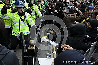 Riot Police and Protesters Clash in London