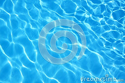 Rippled pattern of clean water in blue swimming pool