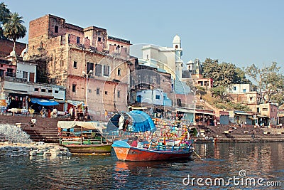 River boat with passengers floats down the river