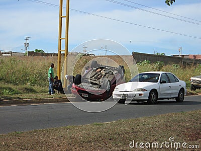 Road accident, flipped car.