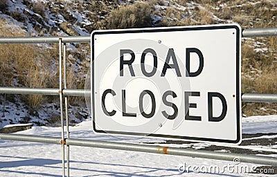Road Closed Sign on Gate Snow Covered Winter
