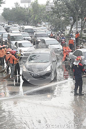 ROAD RECOVERY AFTER DRENCHED VOLCANIC ASH