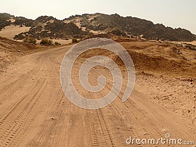 The road running through the Sahara desert.