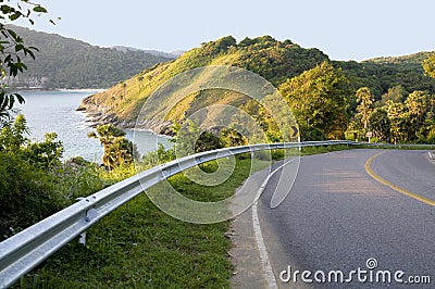 Road with sea view and mountains