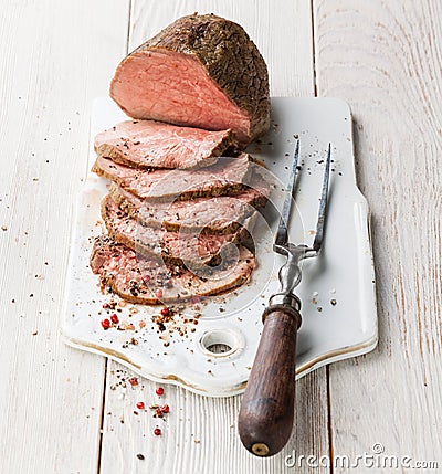 Roast beef and meat fork